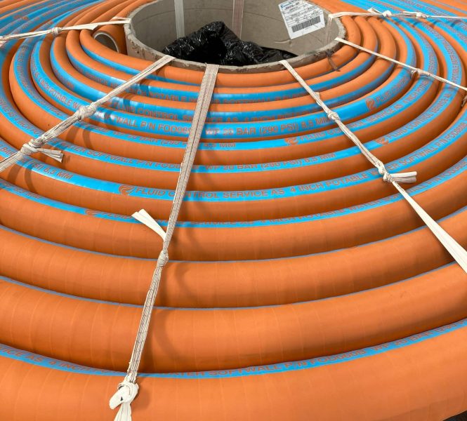 Coiled orange hose for water use