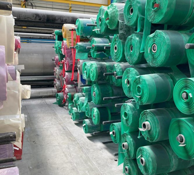 Colorful rolls of rubber materials stacked