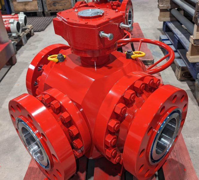 Red industrial trunnion ball valve